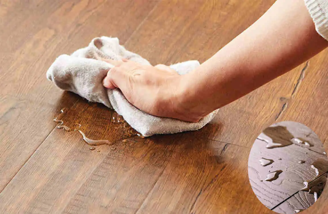 how to dry laminate flooring with water under it
