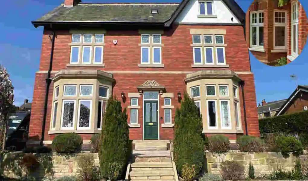 red brick house with white windows