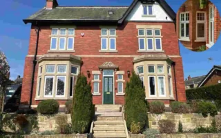red brick house with white windows