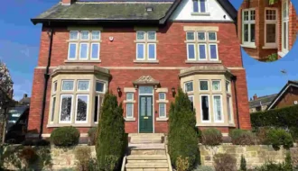 red brick house with white windows