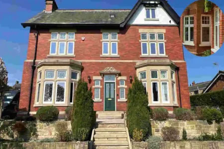 red brick house with white windows